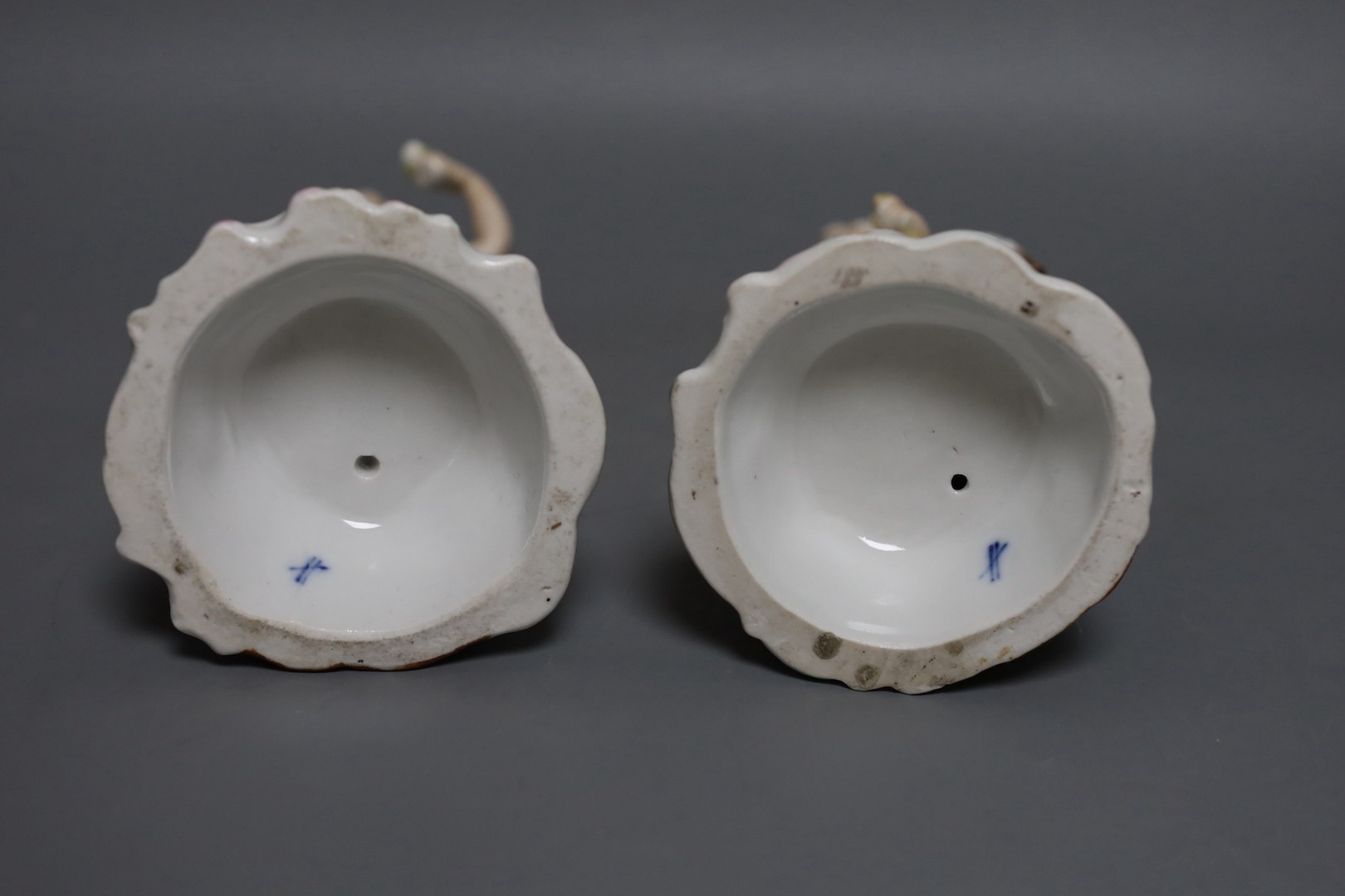 A pair of 19th-century Sitzendorf porcelain candlestick figures